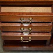 Restored Victorian walnut revolving library.