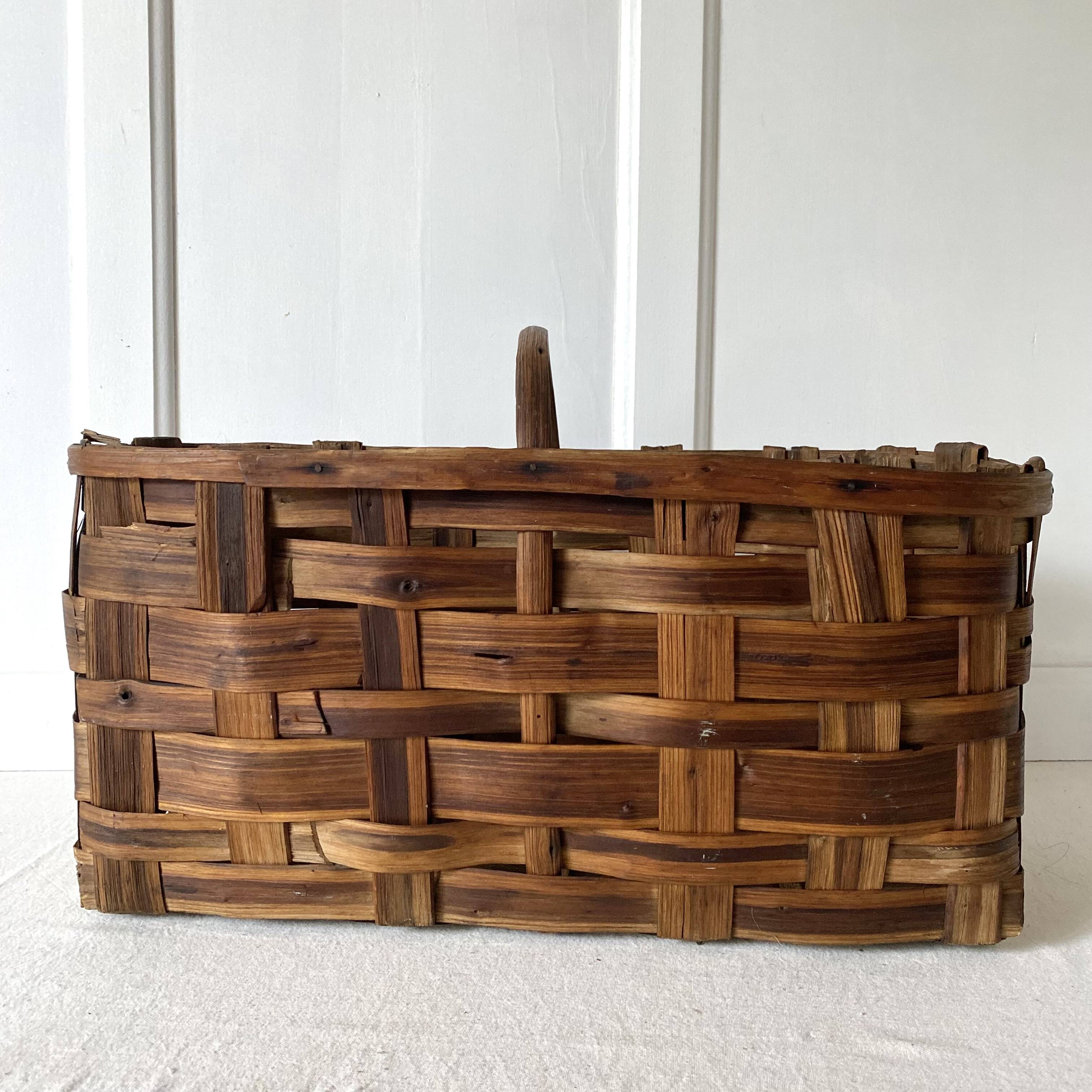 Old basket in woven chestnut wood