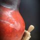 Red ceramic vase