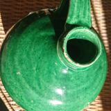 Green enamelled sandstone jug