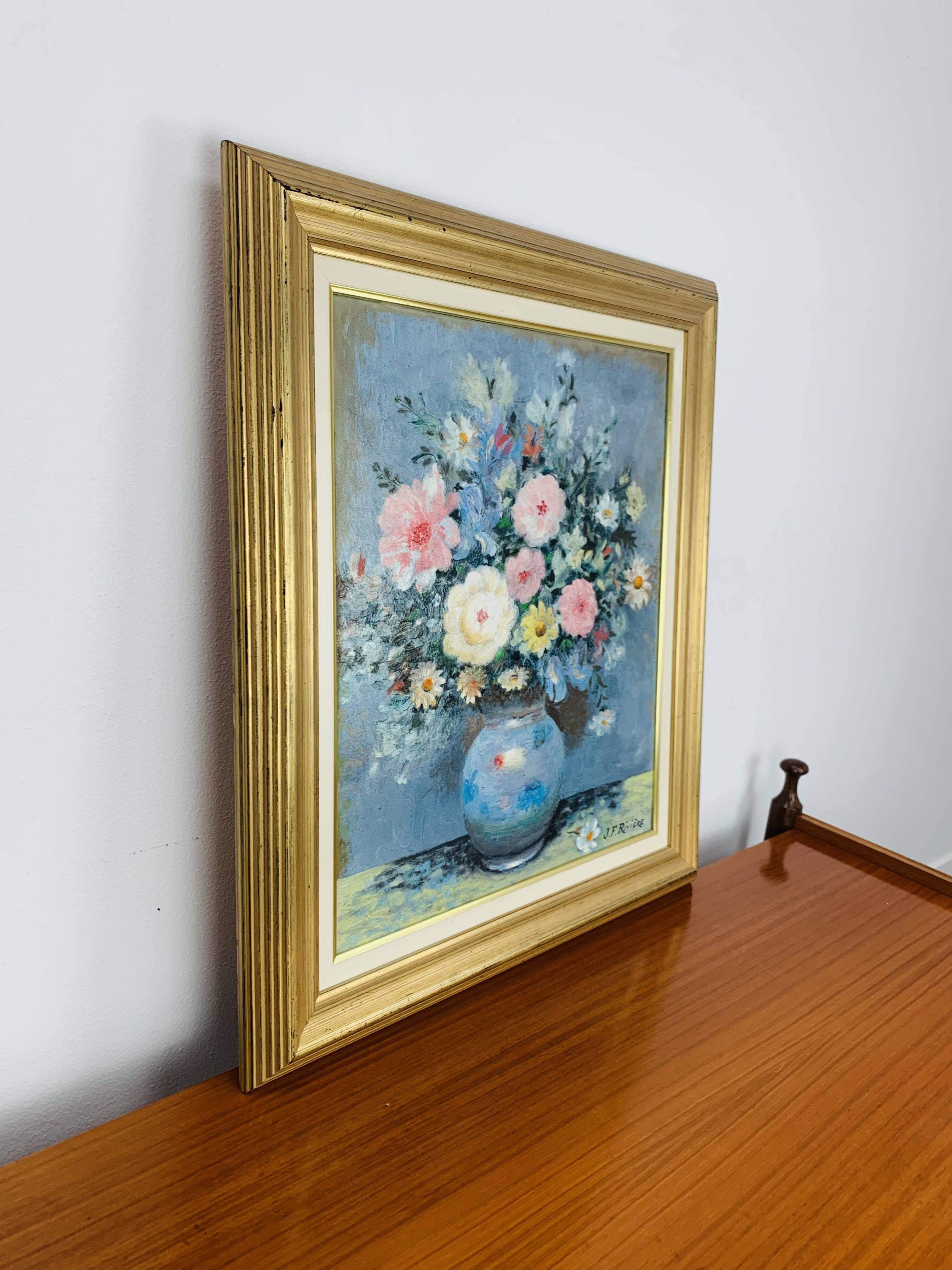 Still life painting of a bouquet of flowers, golden frame