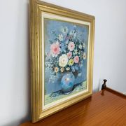 Still life painting of a bouquet of flowers, golden frame