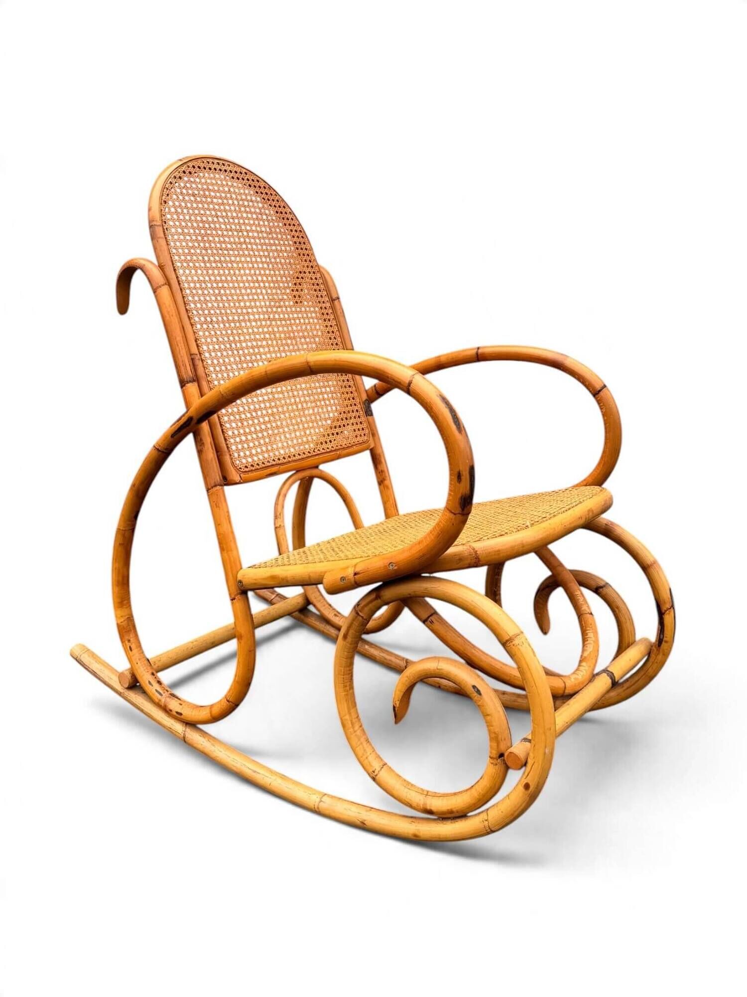 Vintage rocking chair in bamboo and cane