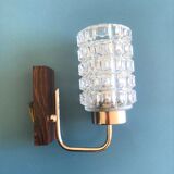 Round wall lamp in molded glass