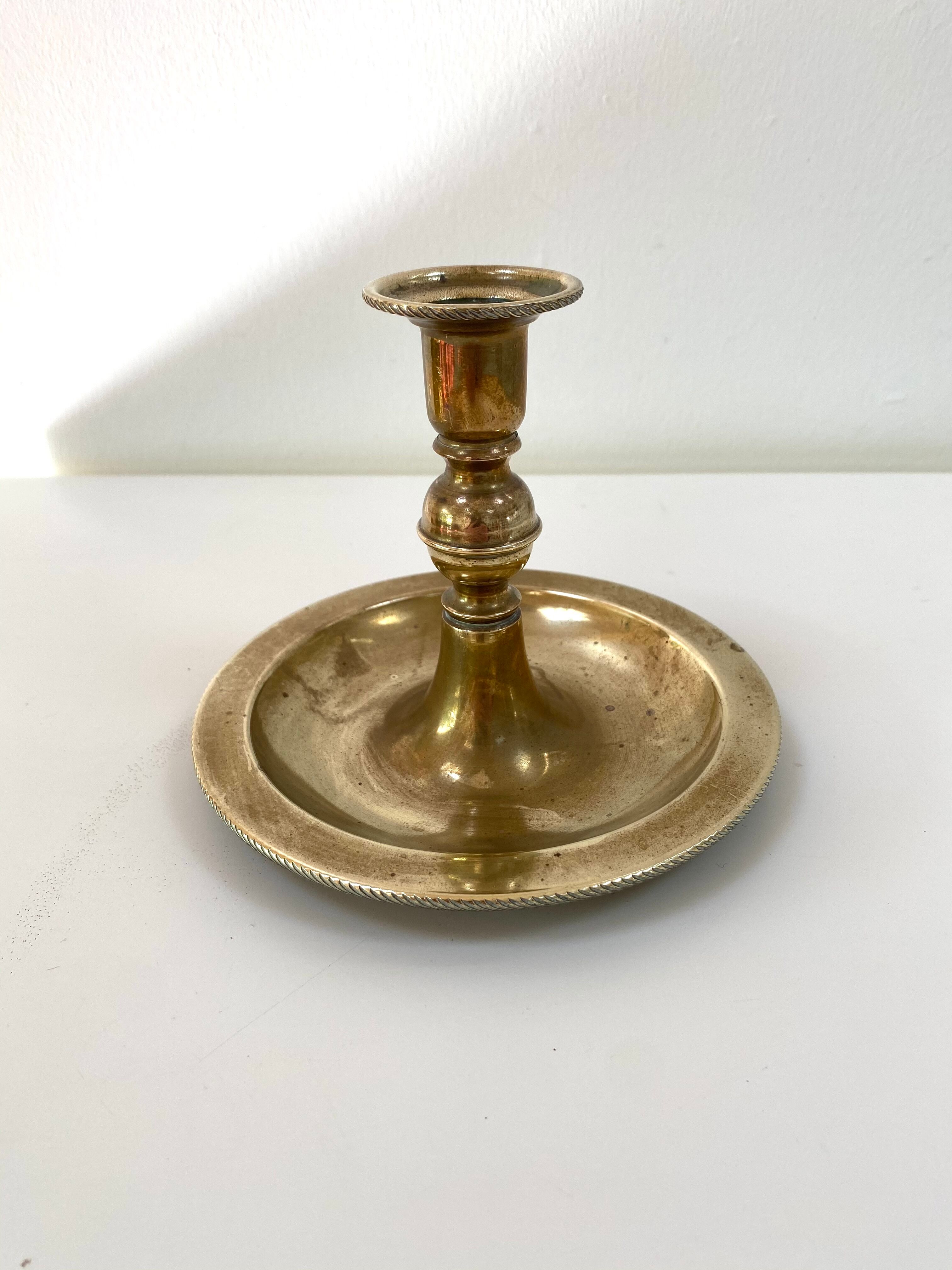 Antique brass candle holder
