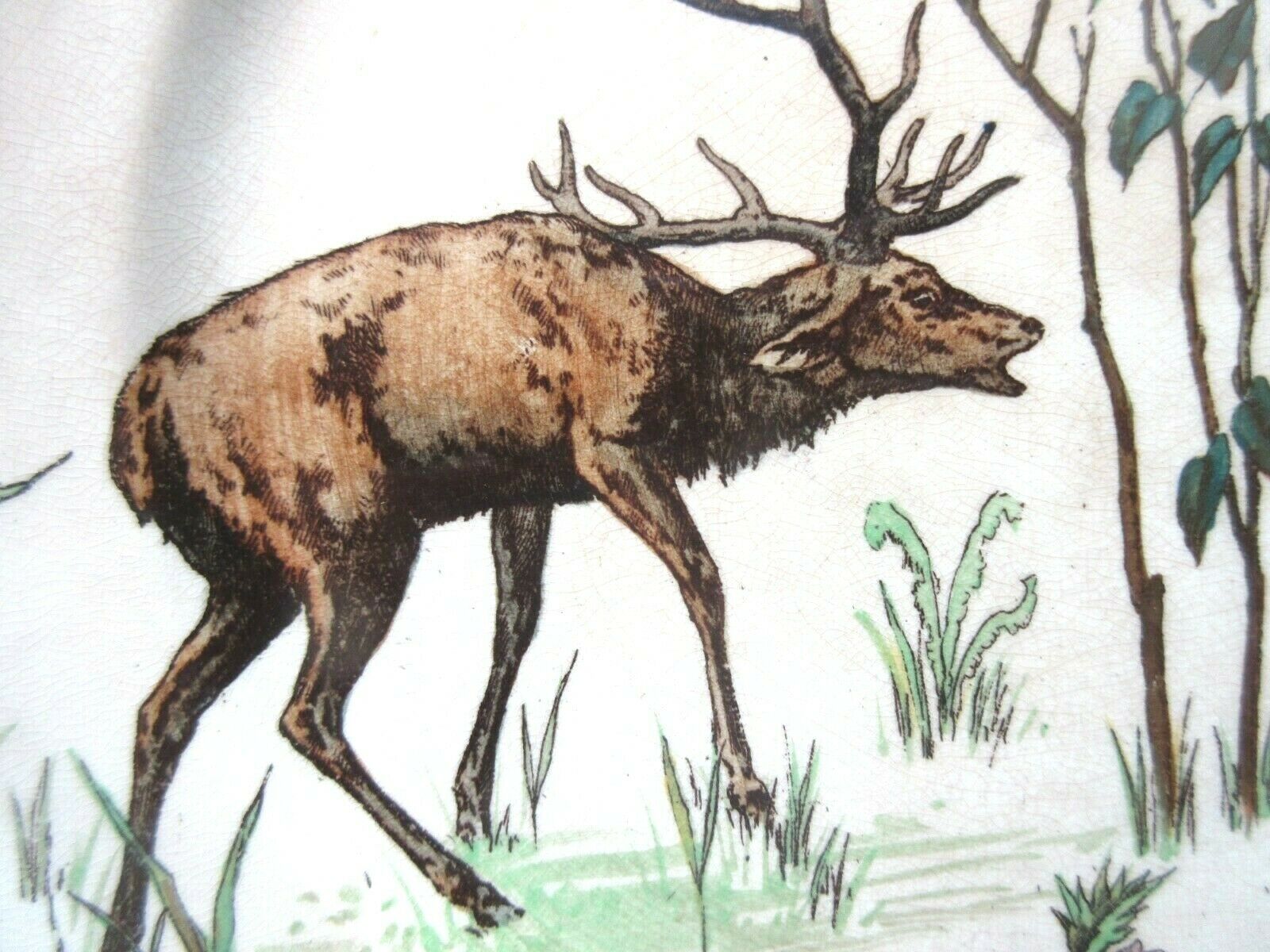 Assiette doulton, grands dépôts de paris: la confrontation des cerfs