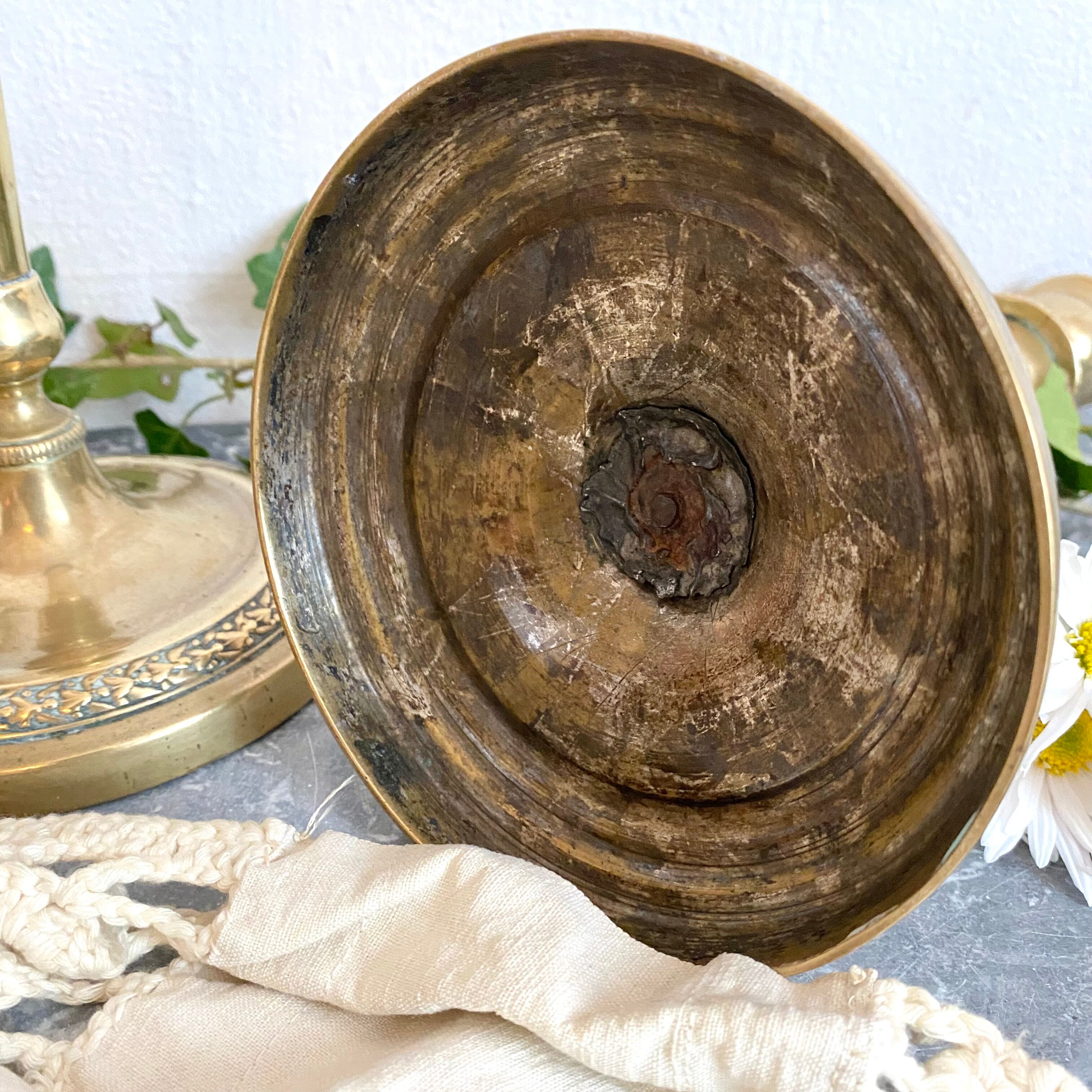Pair of old gilded brass candlesticks