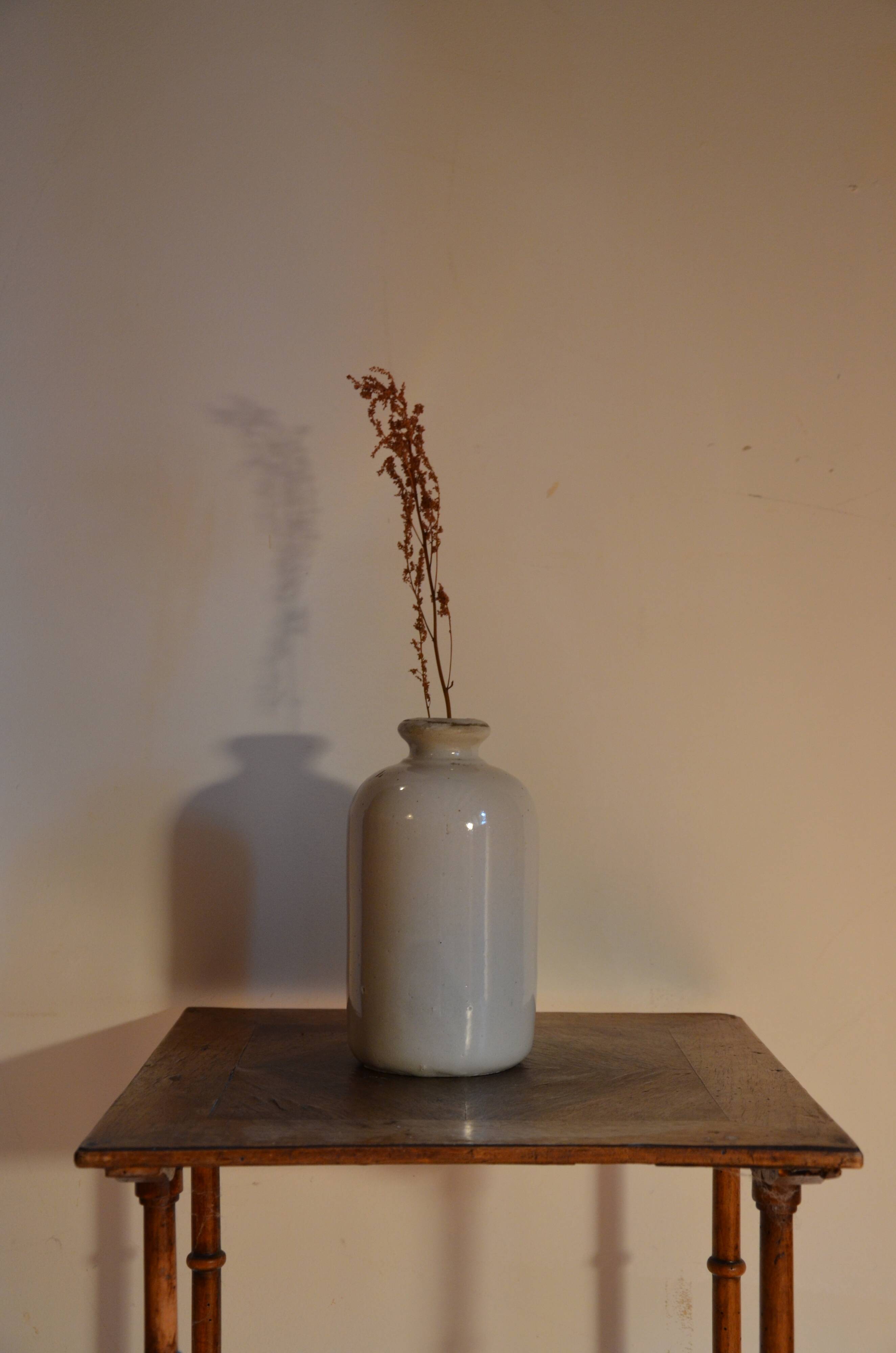 Off-white ceramic soliflore bottle