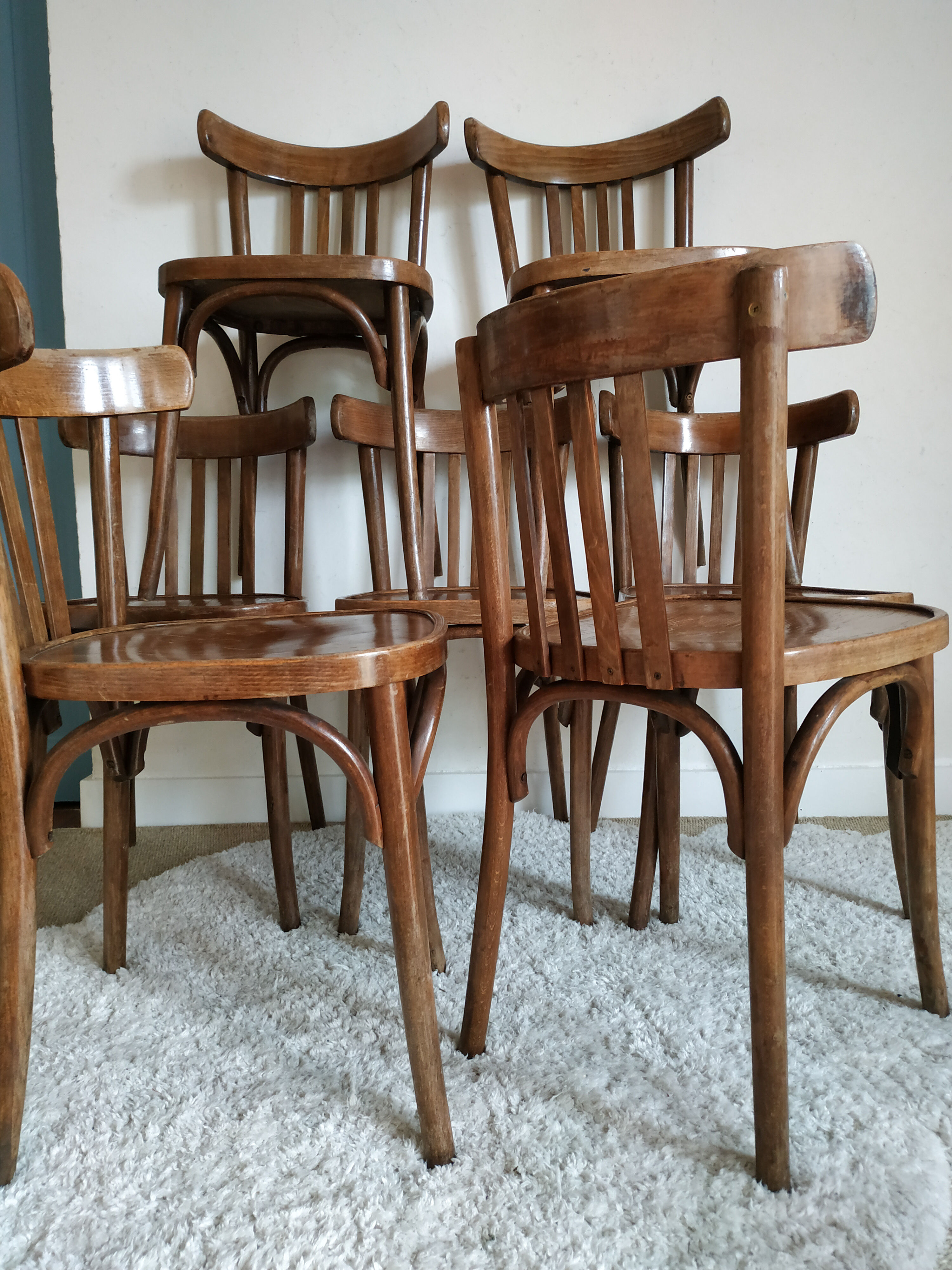 Lot of 7 patinated bistro chairs