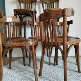 Lot of 7 patinated bistro chairs
