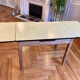 Expandable yellow formica table