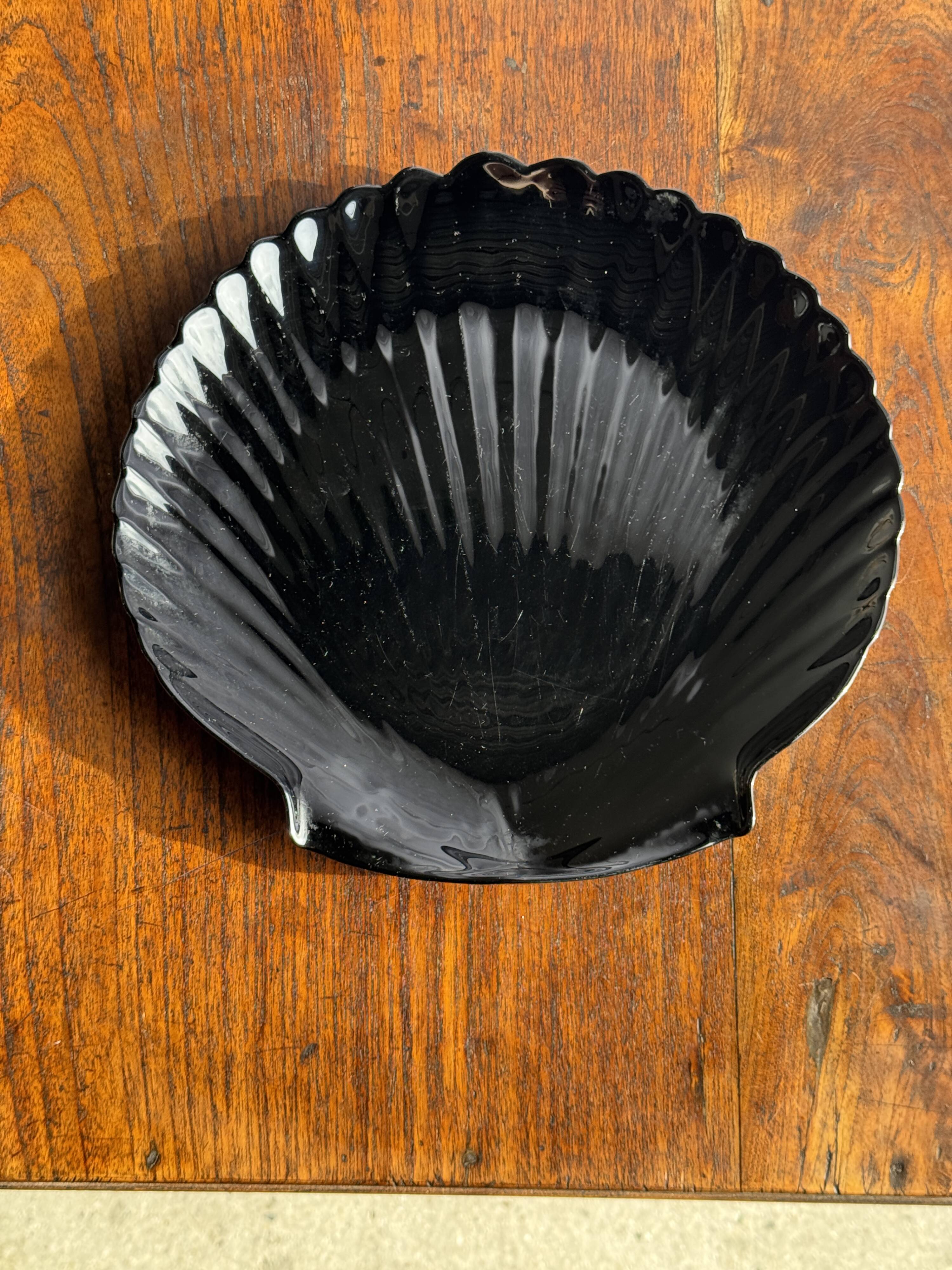 Pair of vintage black glass shell dishes D32 and D26