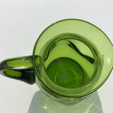 Green water jug in blown glass