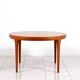 Round dining table in teak by Ib Kofod Larsen for Faarup Mobelfabrik