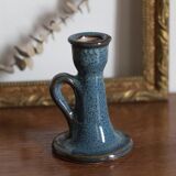 Antique candle holder in glazed ceramic