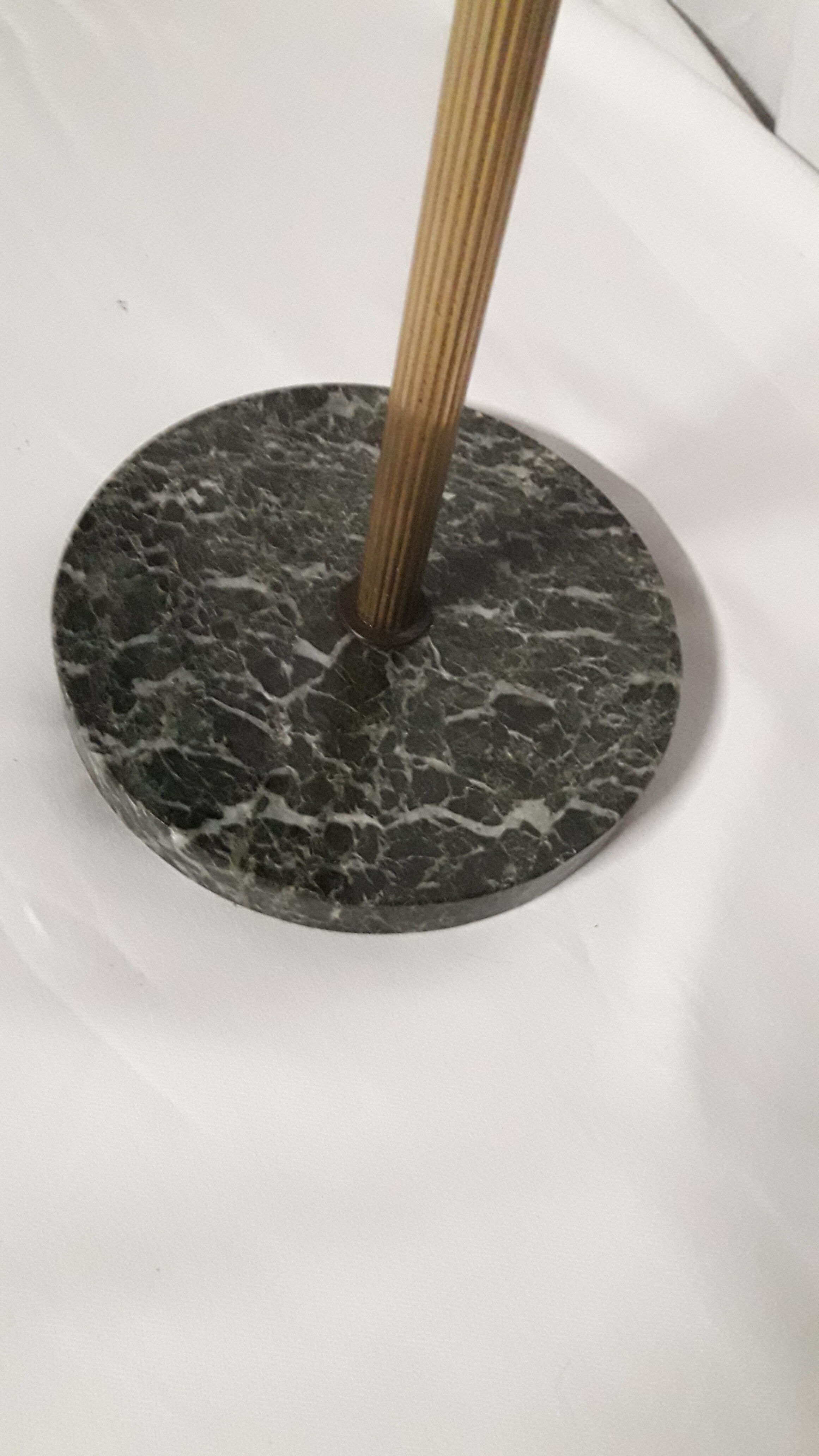 Gold metal standing ashtray and black marble base