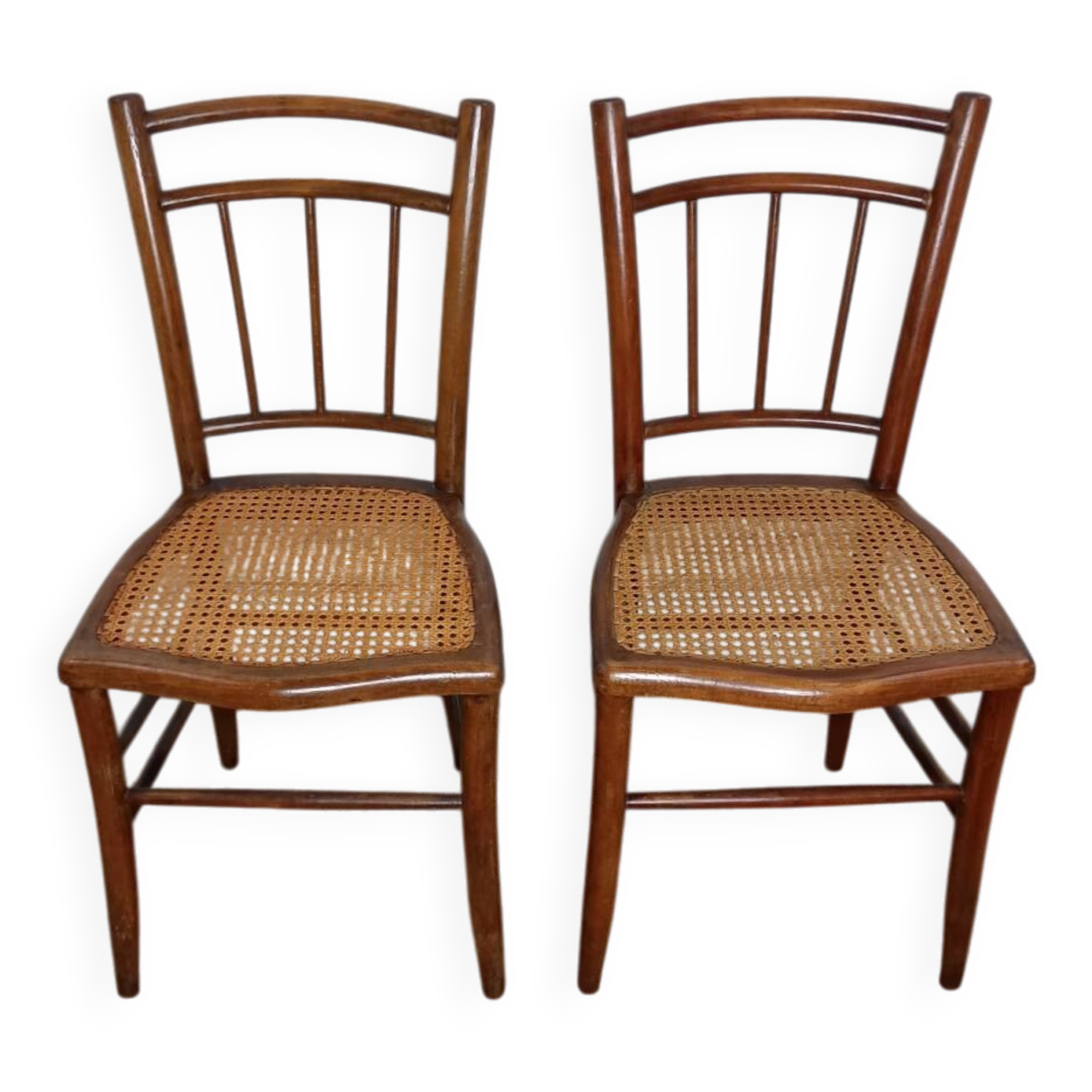 pair of caned bistro chairs from the 1930s