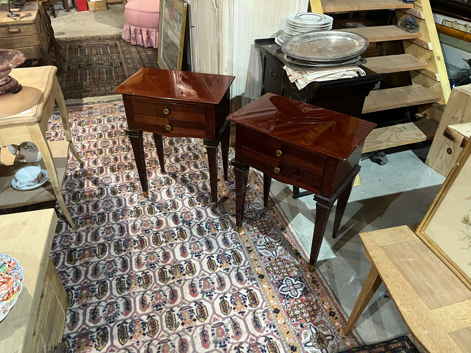 Pair of varnished mahogany bedside tables