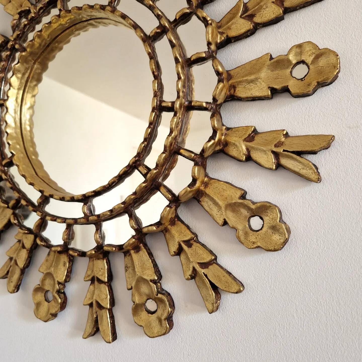 Gilded wooden sun mirror with glazing beads