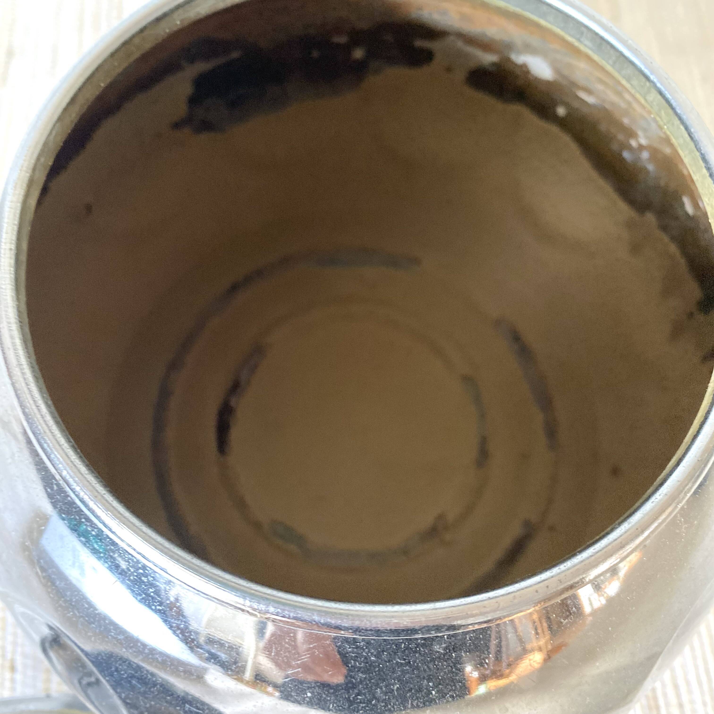 Vintage kettle in chrome metal and bakelite