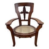 Large caned armchair