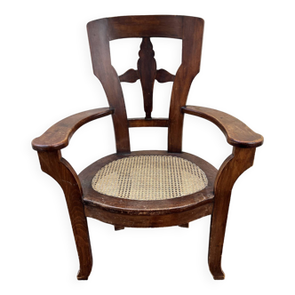 Large caned armchair