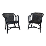 Paire de fauteuils noirs en rotin