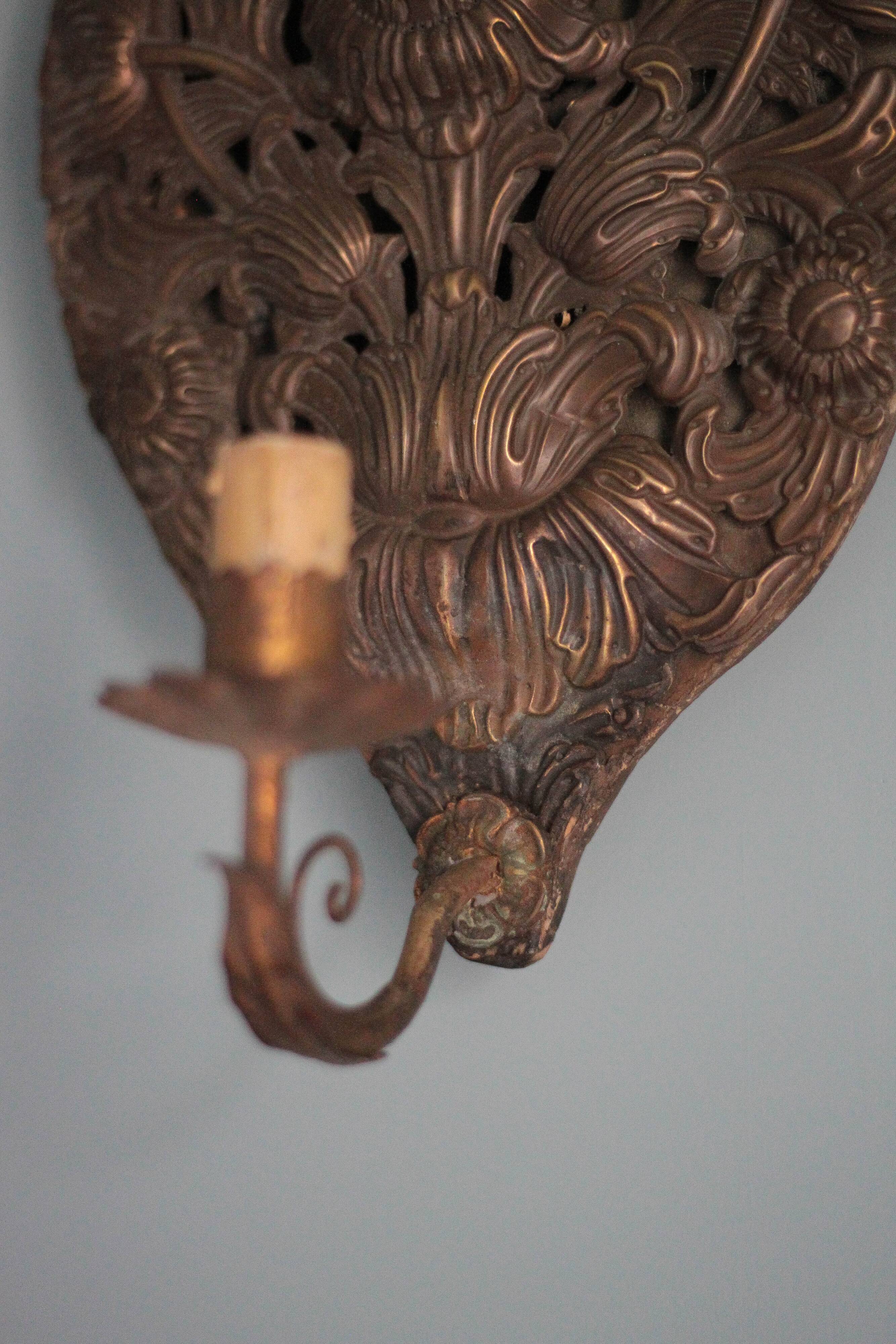 Pair of wall sconces in embossed brass with floral patterns, wall lamp, sconce.