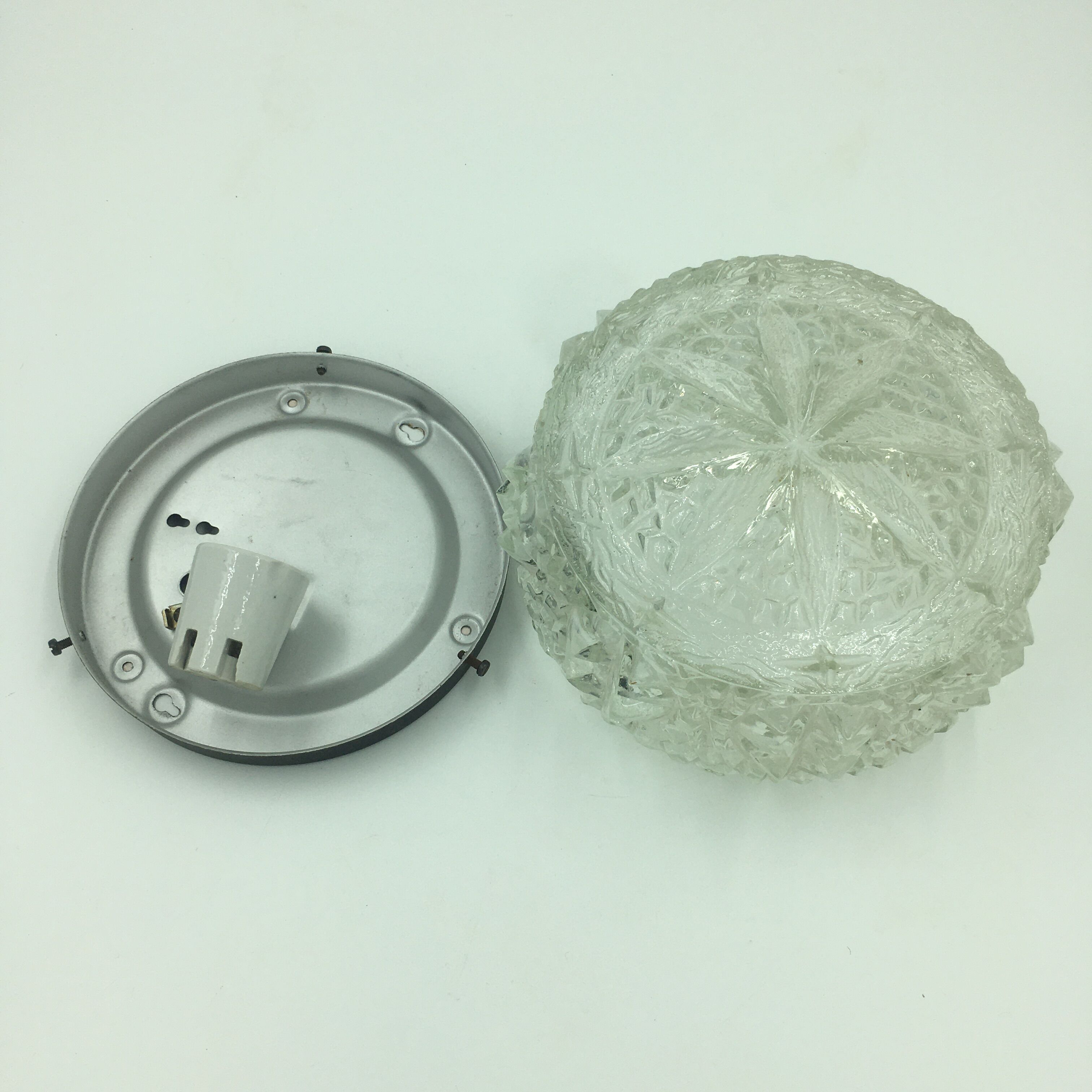 Ceiling lamp in molded glass with relief