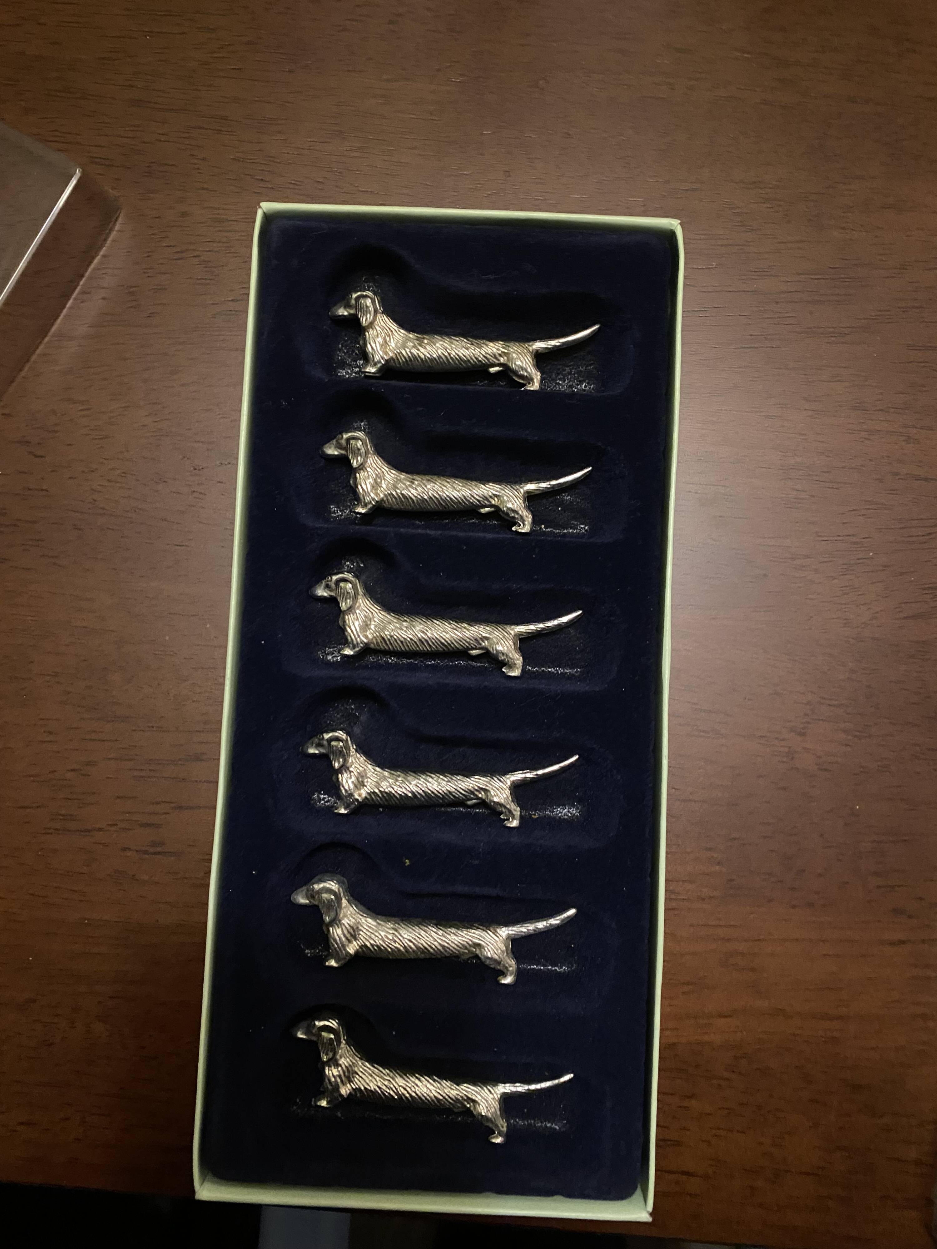 Silver dachshund knife holder