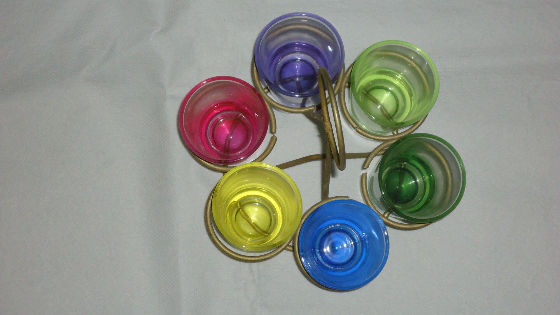 Liqueur glasses on vintage stand