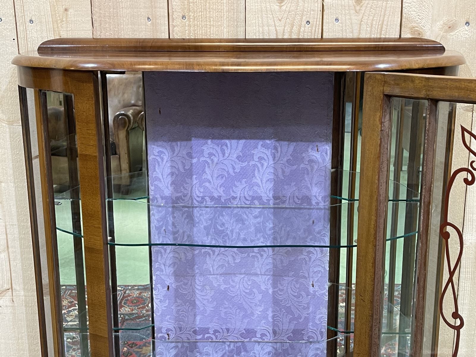 English walnut showcase from the 1930s