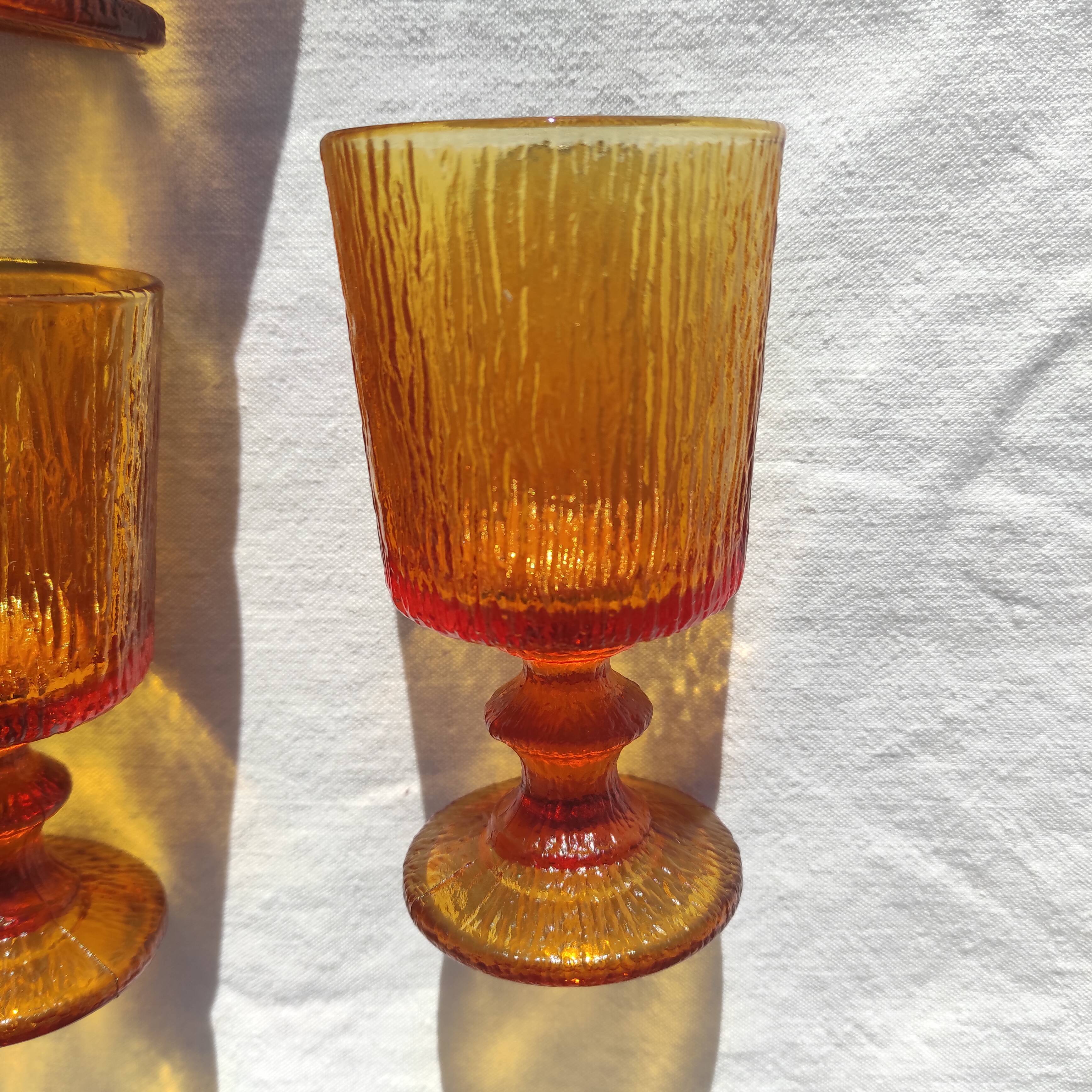 9 orange-stemmed wine glasses circa 1970
