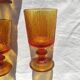 9 orange-stemmed wine glasses circa 1970