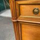 Secretary with drop-leaf in Louis XVI style, made of solid wood and brass, desk/commode.