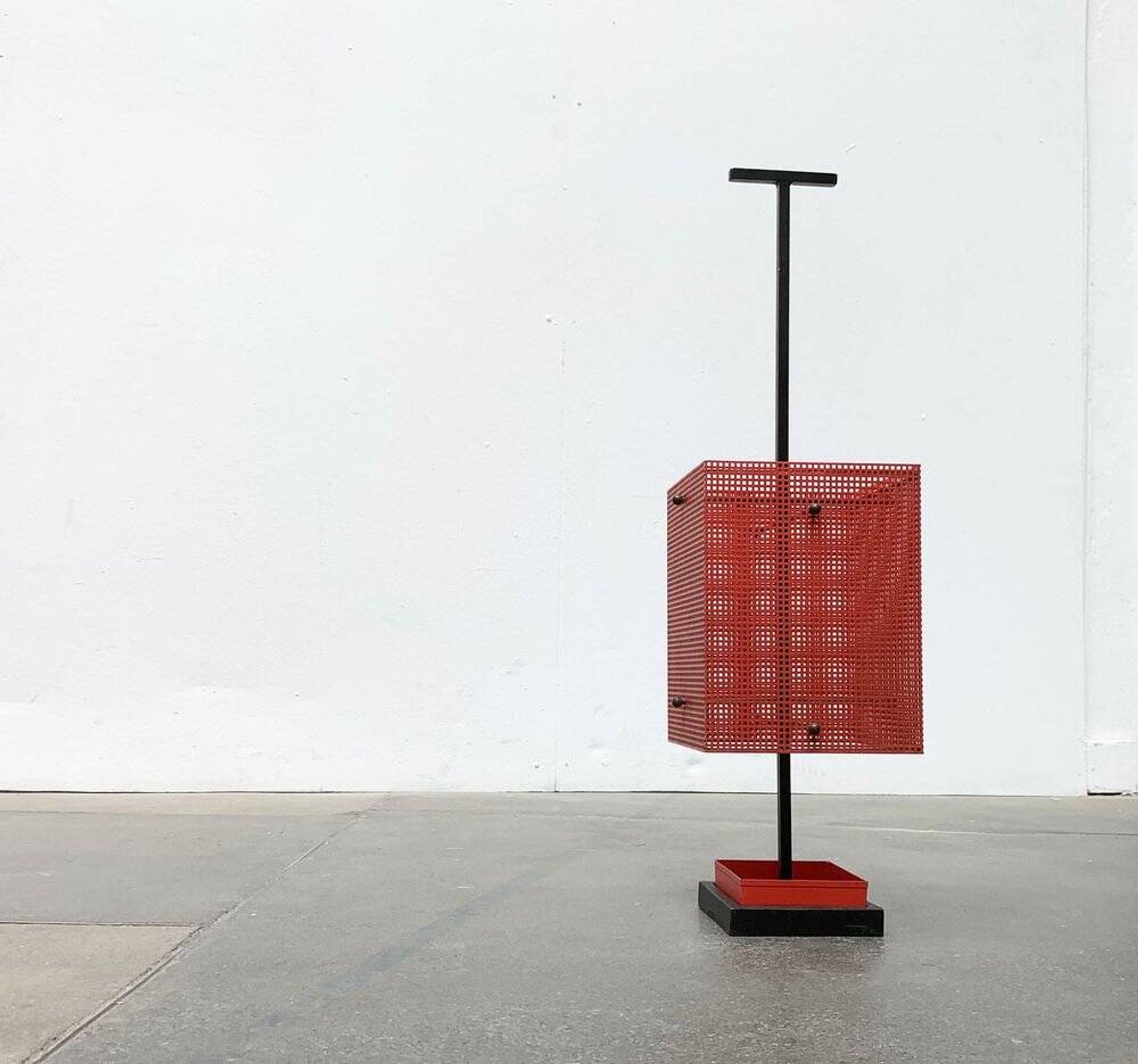 Minimalist perforated steel umbrella stand, 1960s