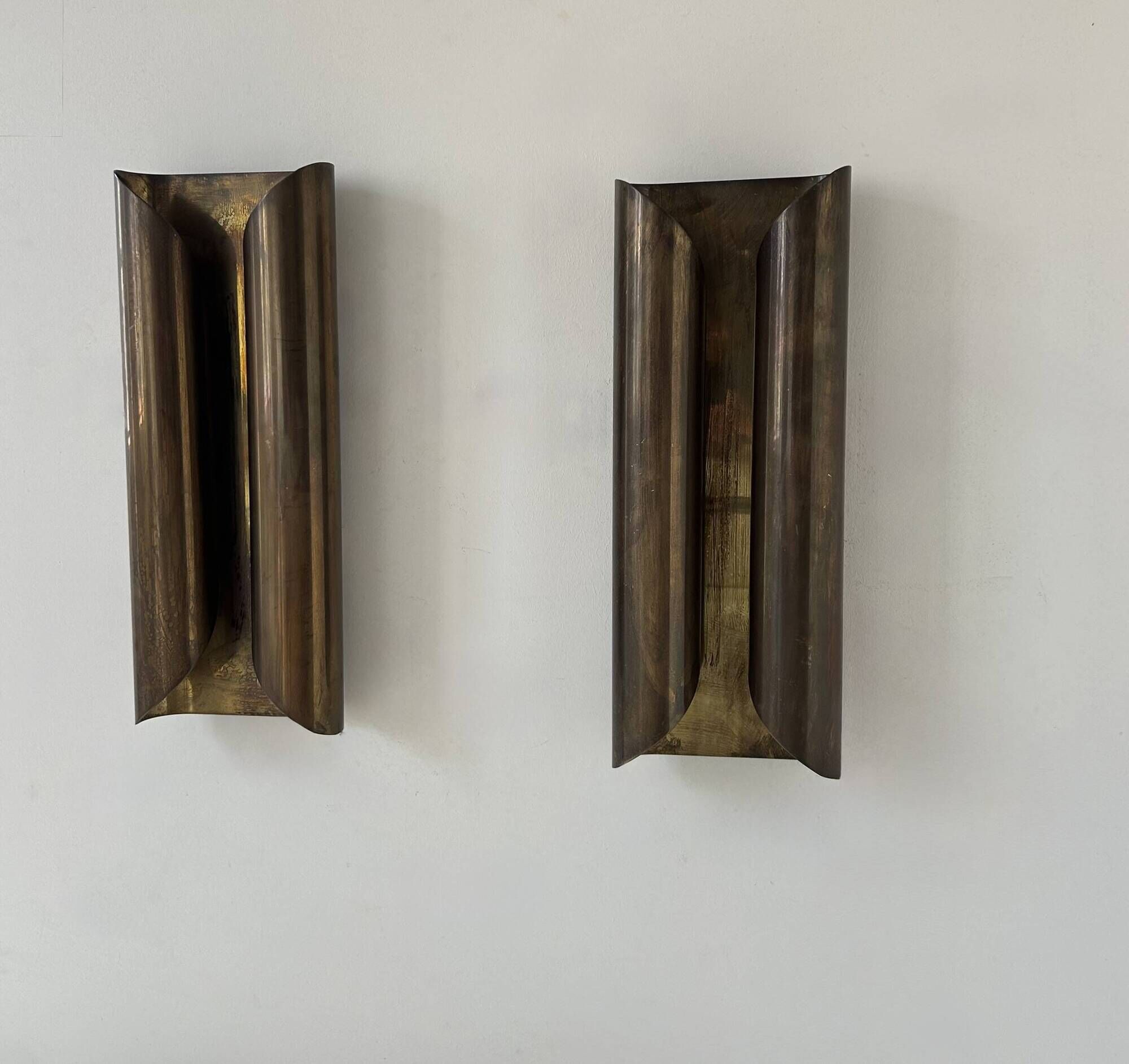 Pair of vintage wall lights in patinated brass, France 1970