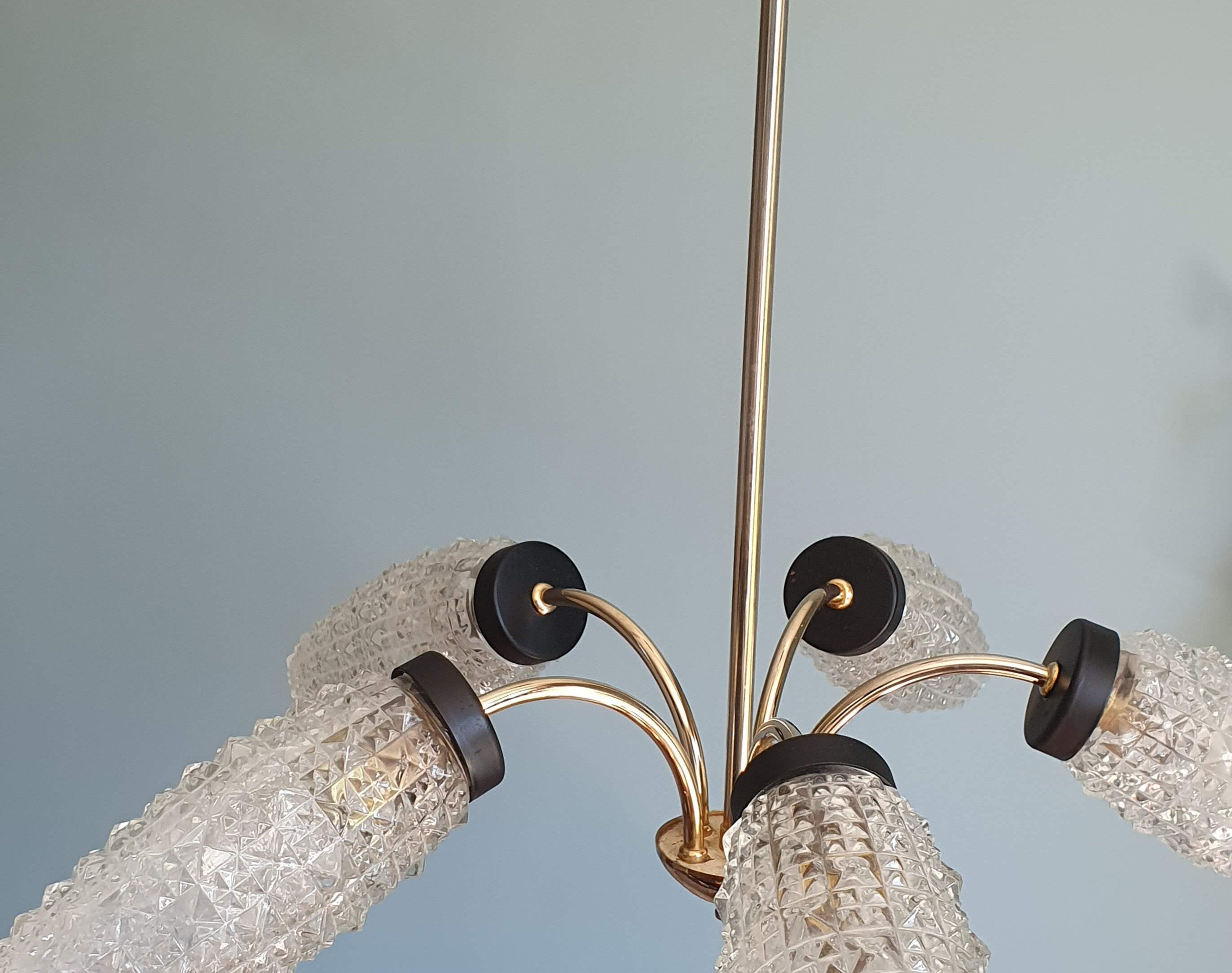 Vintage chandelier in brass and glass