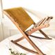 Old wooden rocking footrest with velvet fabric