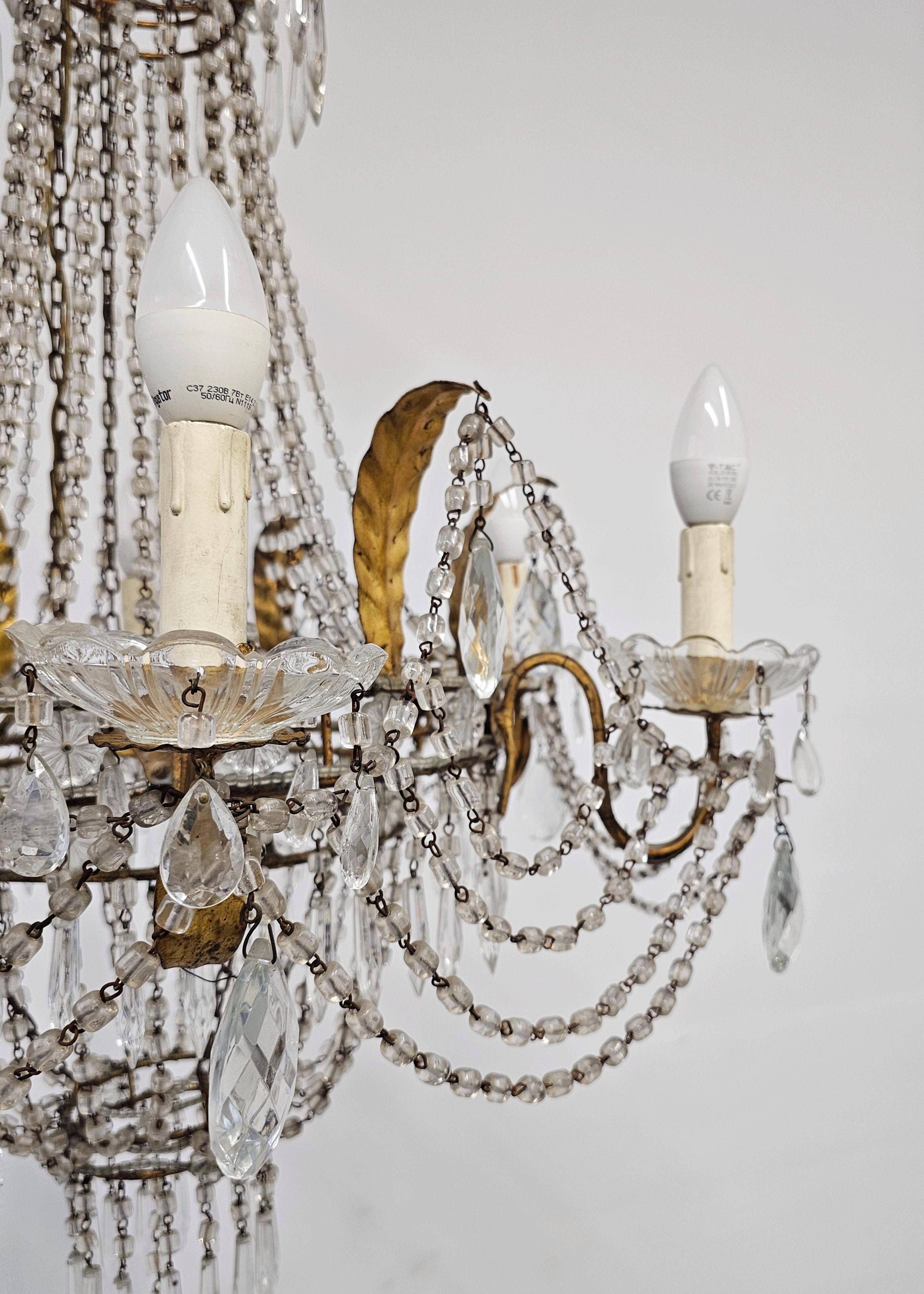 Antique crystal chandelier with floral details 1910