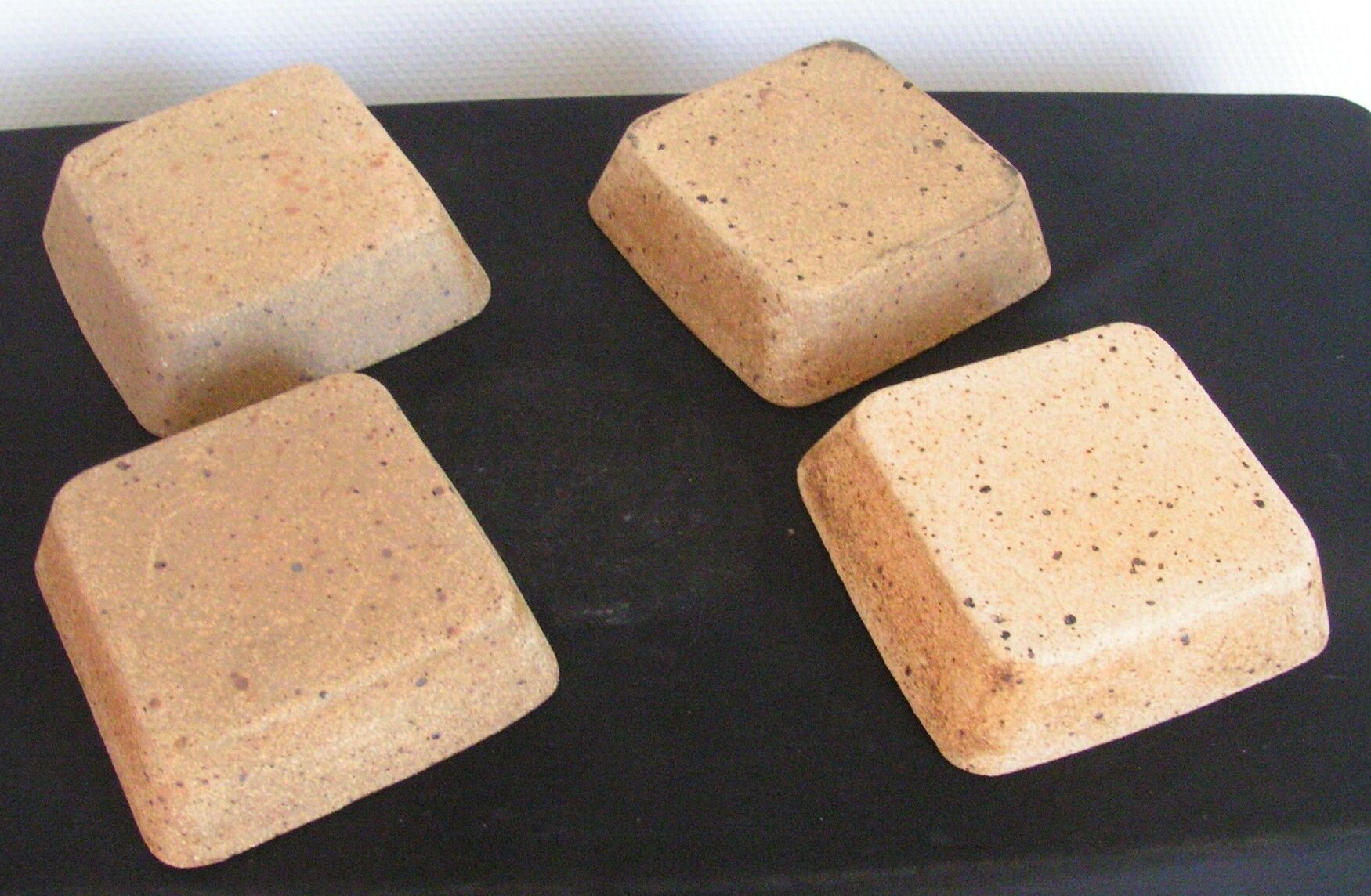 Set of four sandstone ramekins