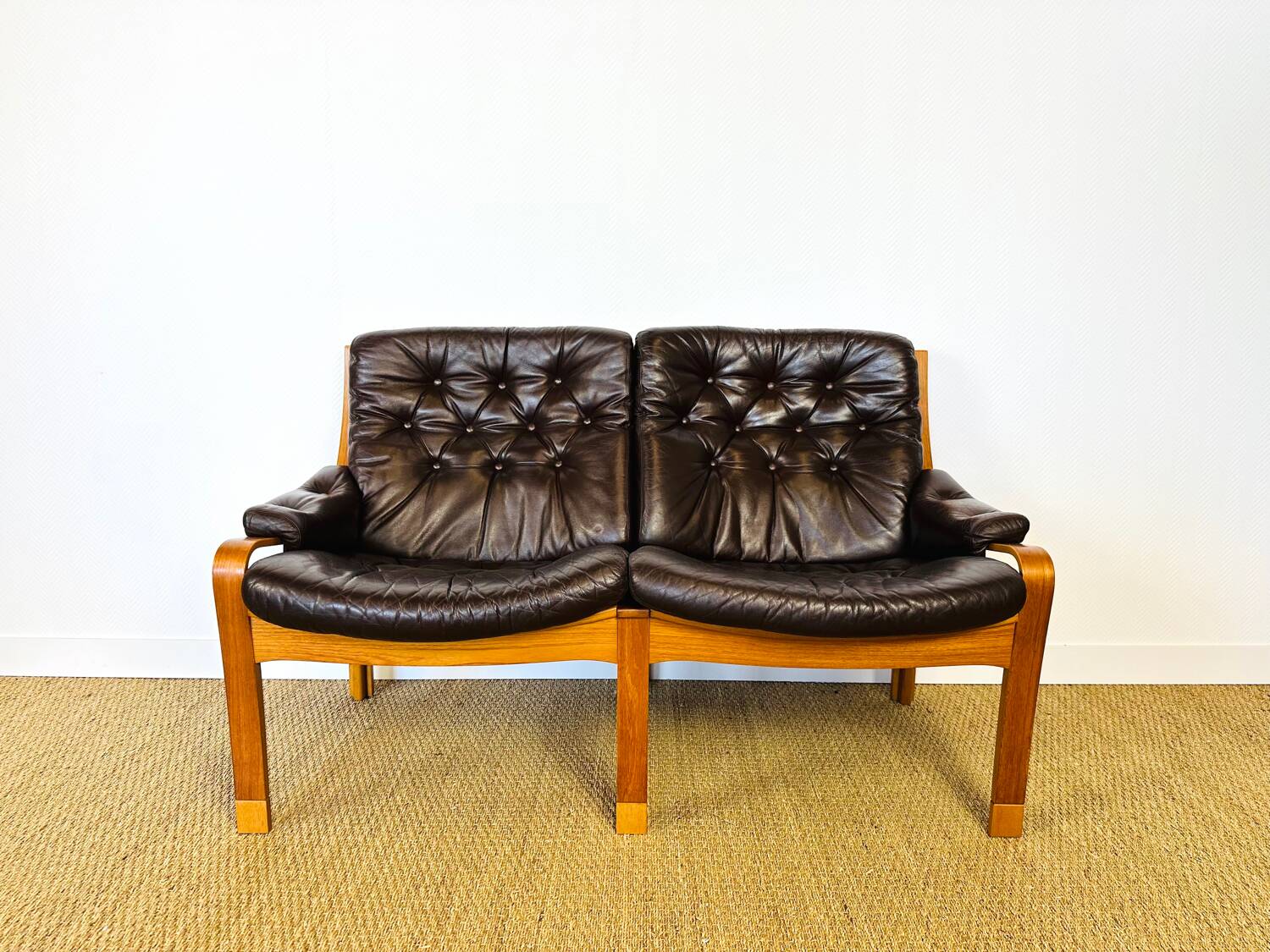 Scandinavian leather and teak bench from the 1960s.