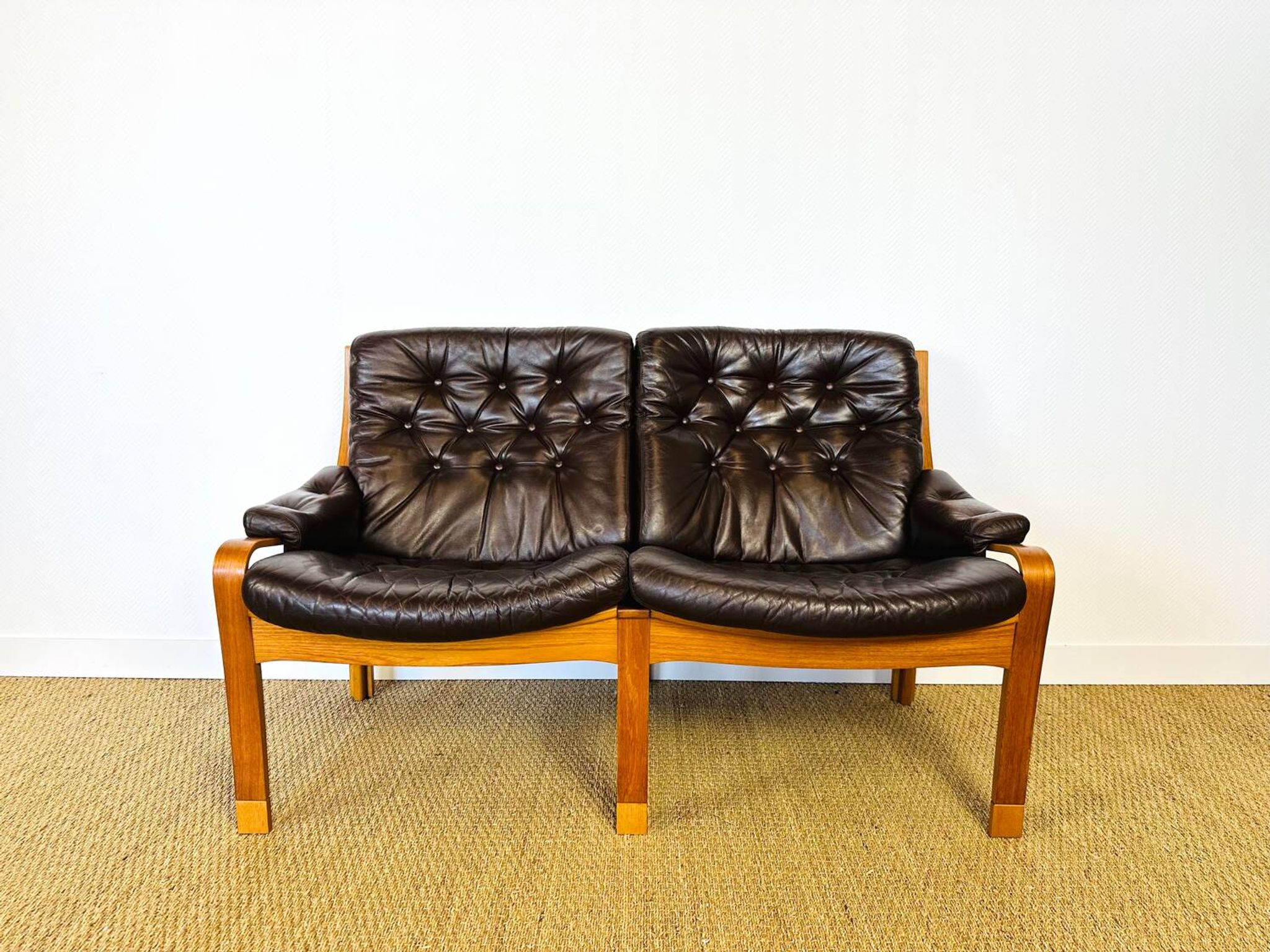Scandinavian leather and teak bench from the 1960s.