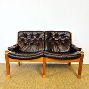 Scandinavian leather and teak bench from the 1960s.