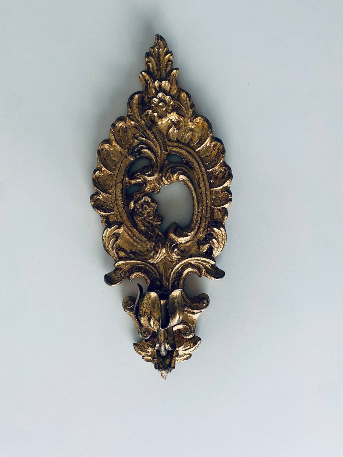 Gold wall candle holder