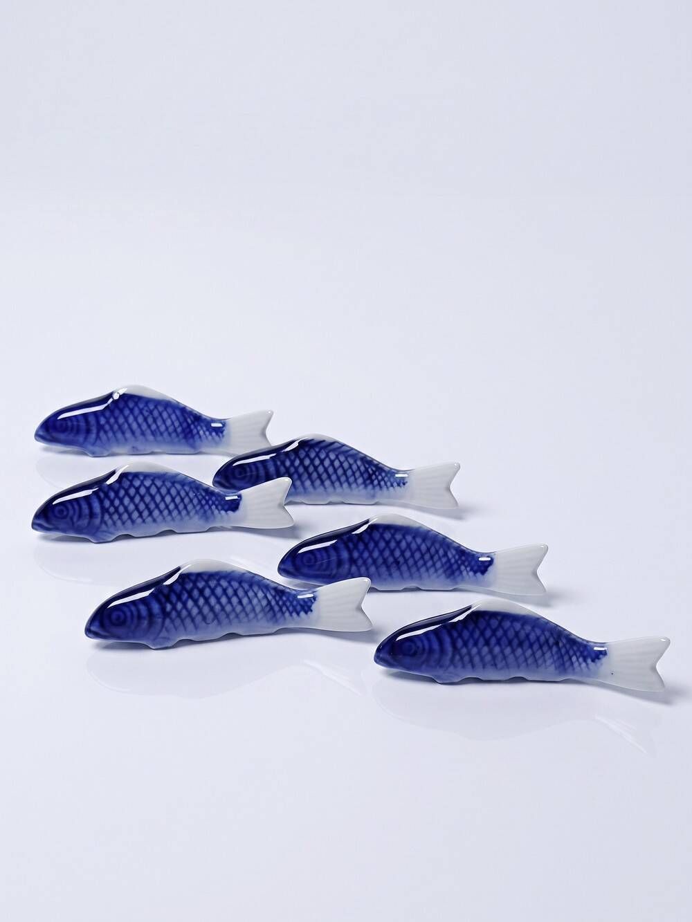 6 porcelain koi carp chopstick/knife rests, China, 1960s-1980s