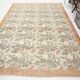 Tapis en laine et coton à décor floral