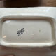 Old dishes in earthenware floral motif