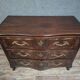 Louis XV/XVIII period Lyonnaise commode in moulded and carved walnut.