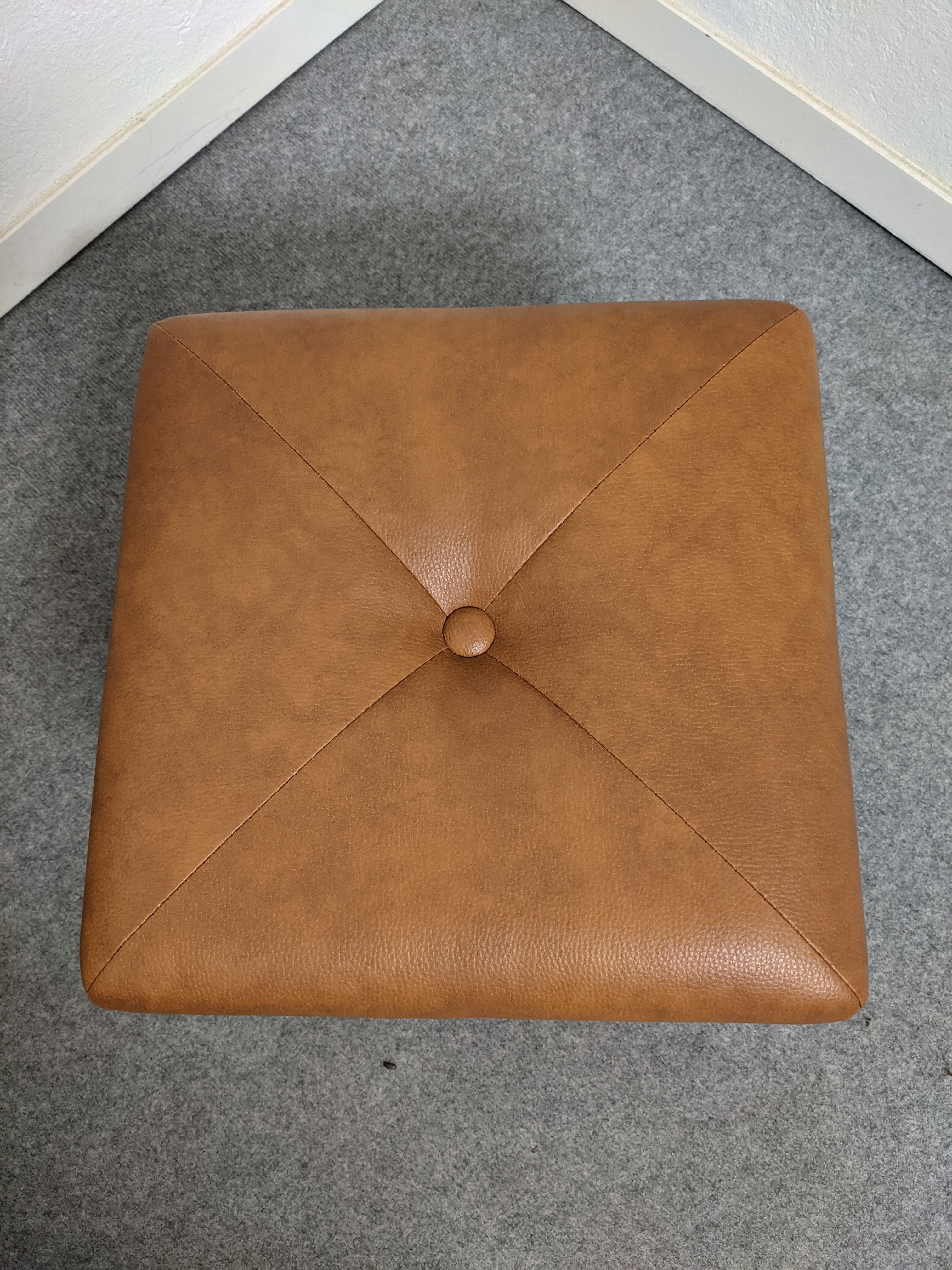 Vintage leather ottoman